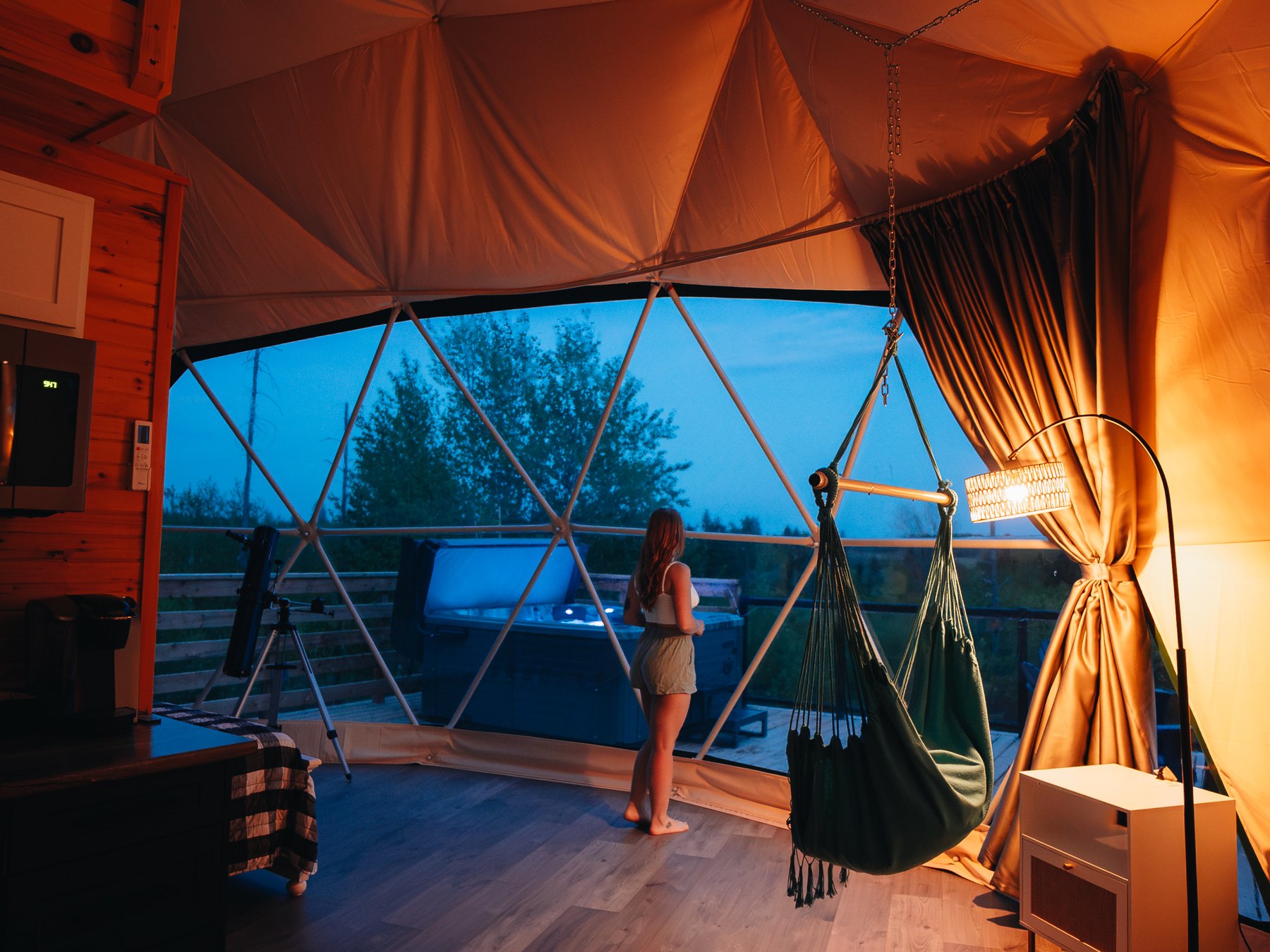 Harbor Haven — blue hour through the panoramic dome window