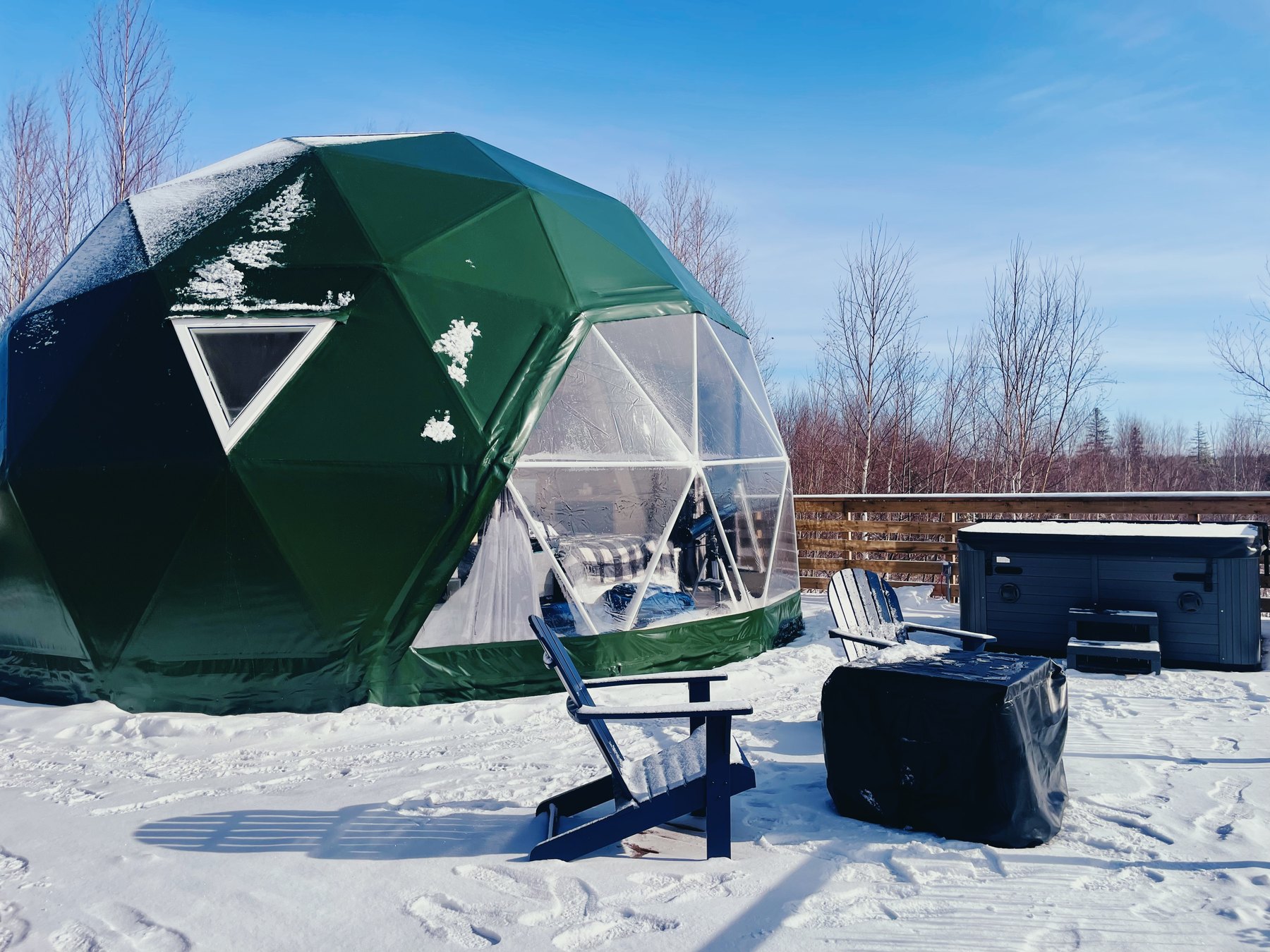 Harbor Haven — the dome and hot tub on a clear winter day