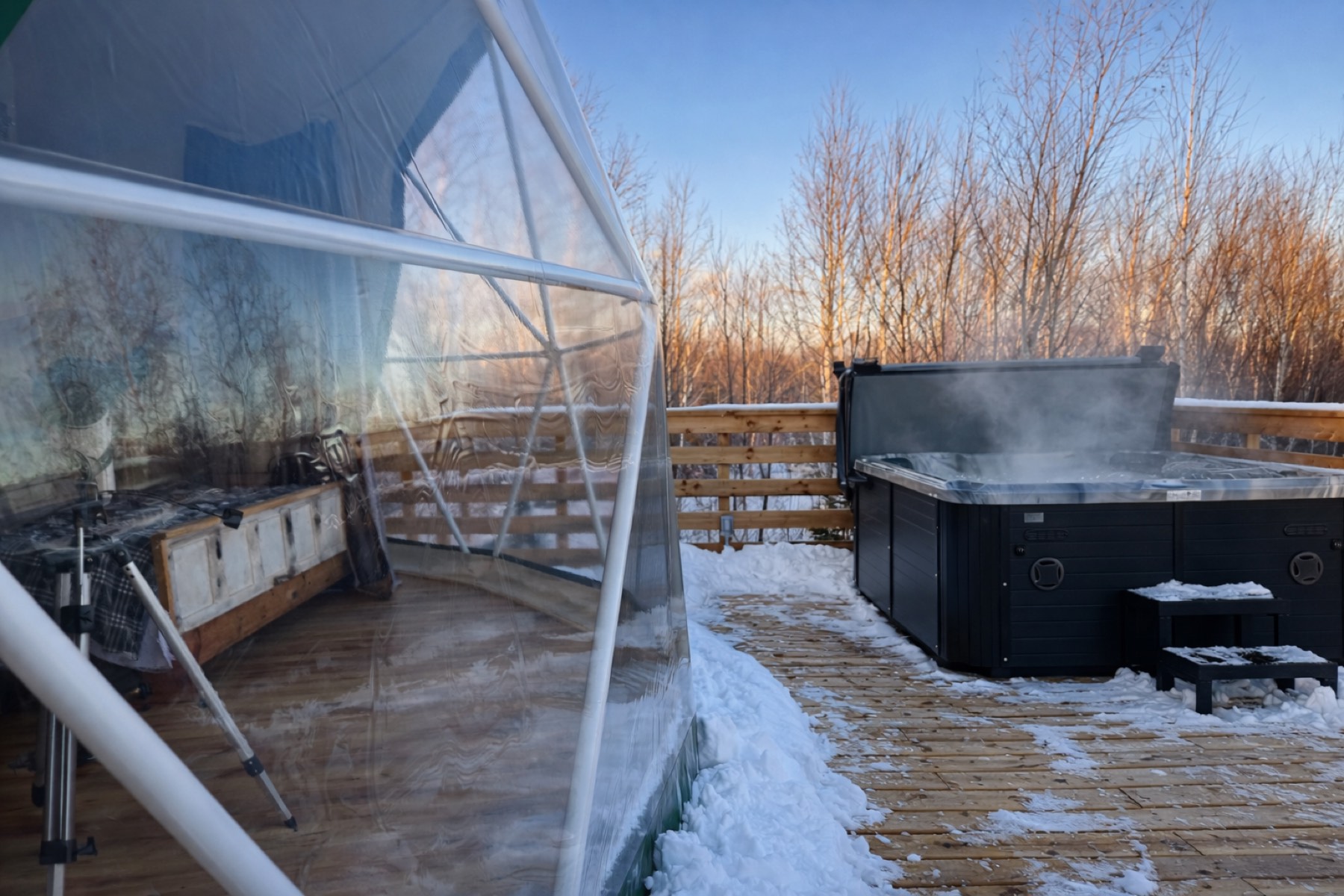 Private hot tub on the dome deck at sunset